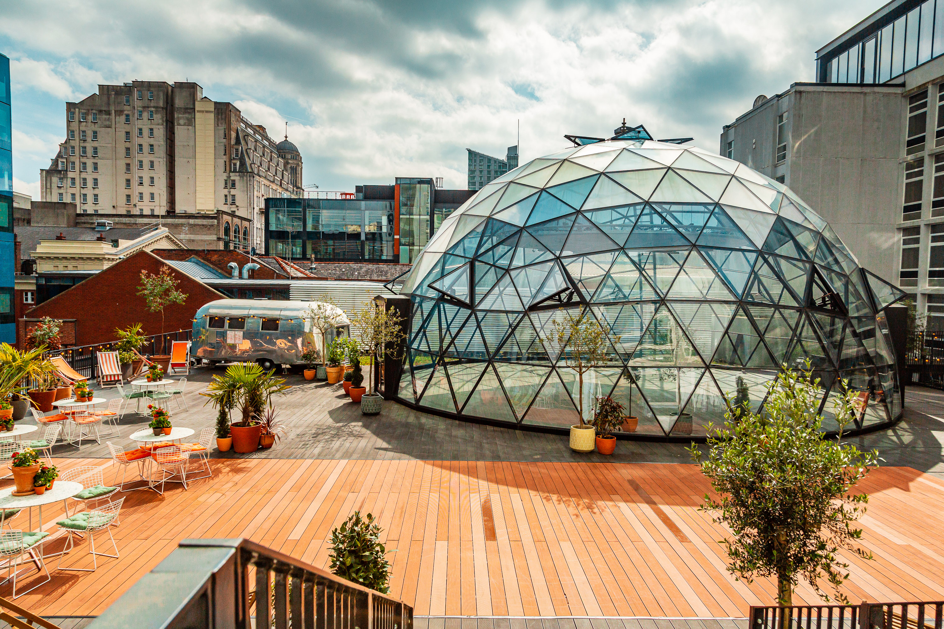 The Dome event space with a striking glass dome, perfect for gatherings and workshops.