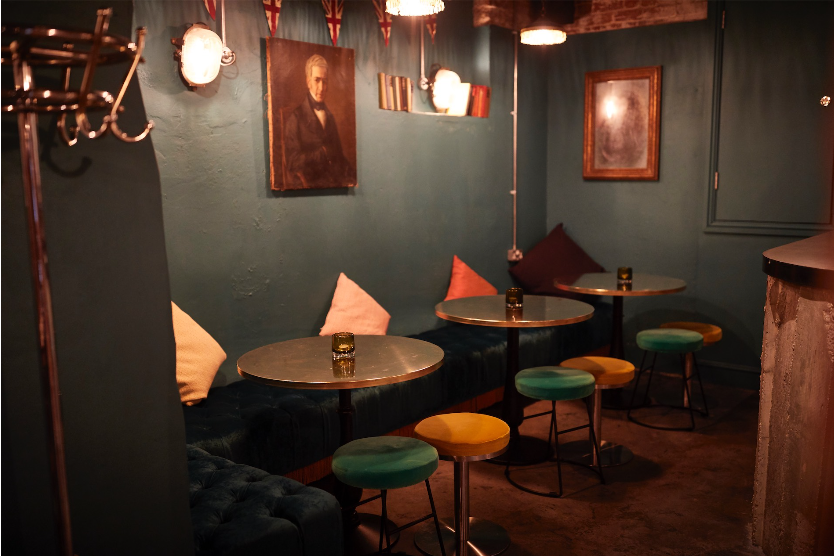 Cozy Firefly Cellar Bar with plush seating, perfect for networking events and gatherings.