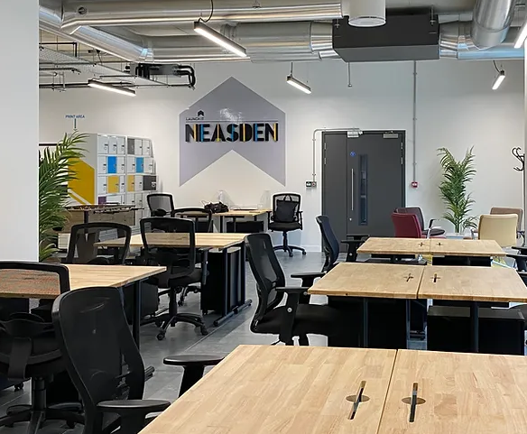 Modern flexible workspace with natural light for networking and team-building events.