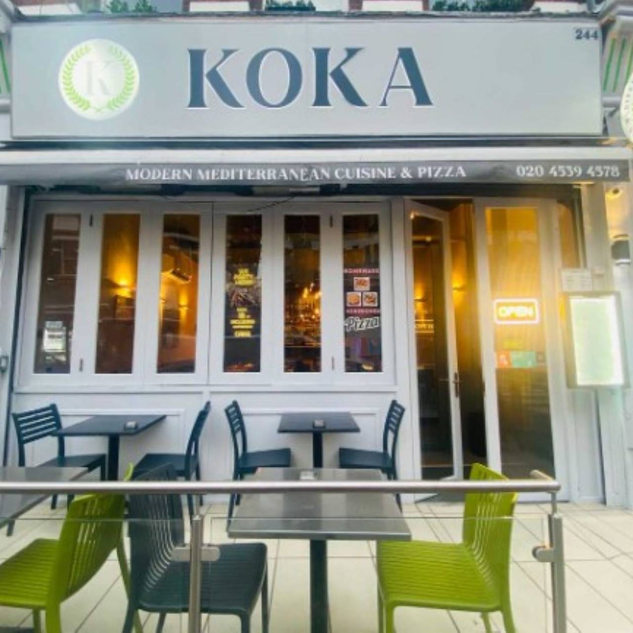 Cozy Koka Restaurant exterior with outdoor seating for intimate gatherings and networking events.