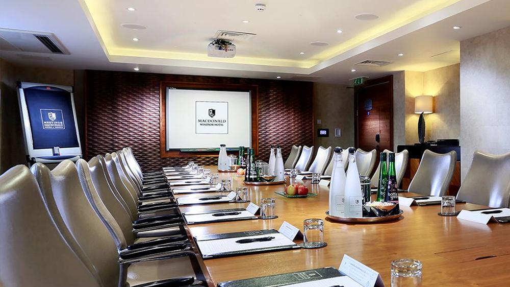 Kensington Boardroom at Macdonald Windsor Hotel, ideal for professional meetings and conferences.