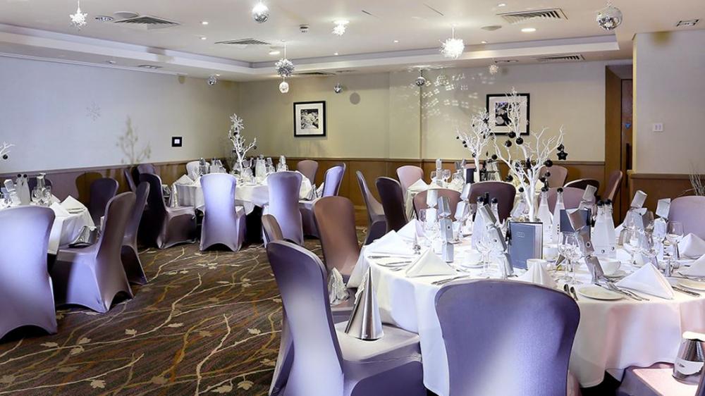 Elegant banquet room at Macdonald Windsor Hotel for corporate events and gatherings.