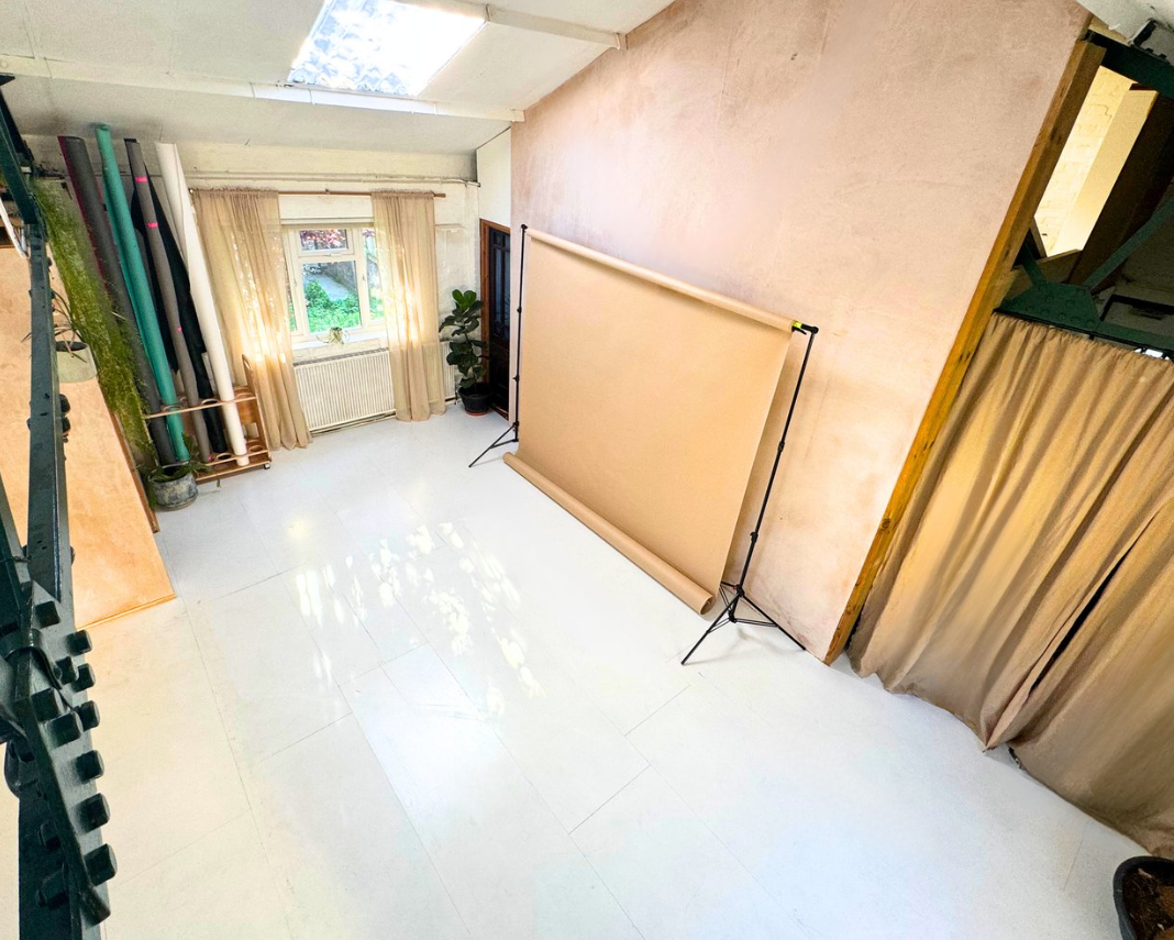 Versatile event space with natural light, ideal for intimate meetings and workshops.