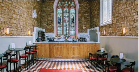 Stylish event space with stained glass, ideal for conferences and gatherings in Northampton.