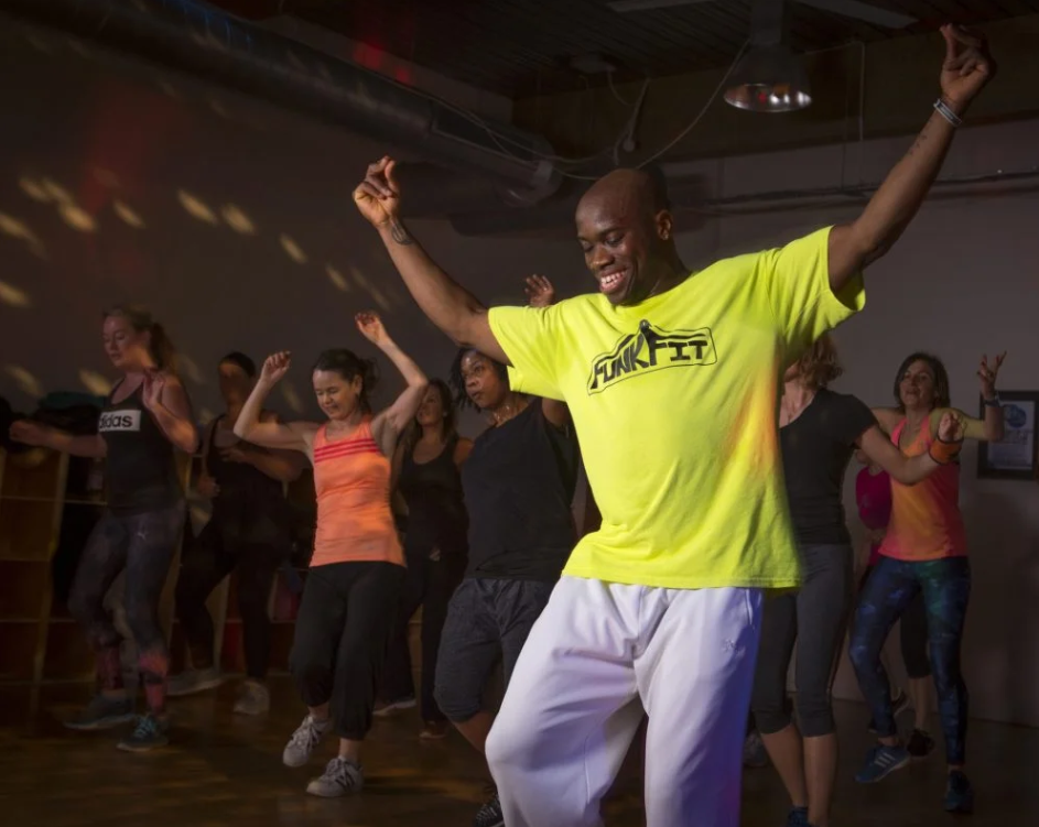 Vibrant adult fitness class at Streetfunk Studios, ideal for wellness events and team-building.