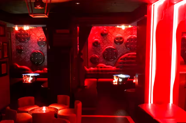 Intimate Leather Room at 141 Park Lane, perfect for exclusive events and cocktail parties.
