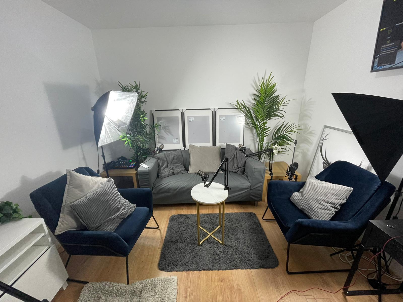 Cozy meeting room with sofa and chairs for podcasts and interviews at DB Music London.