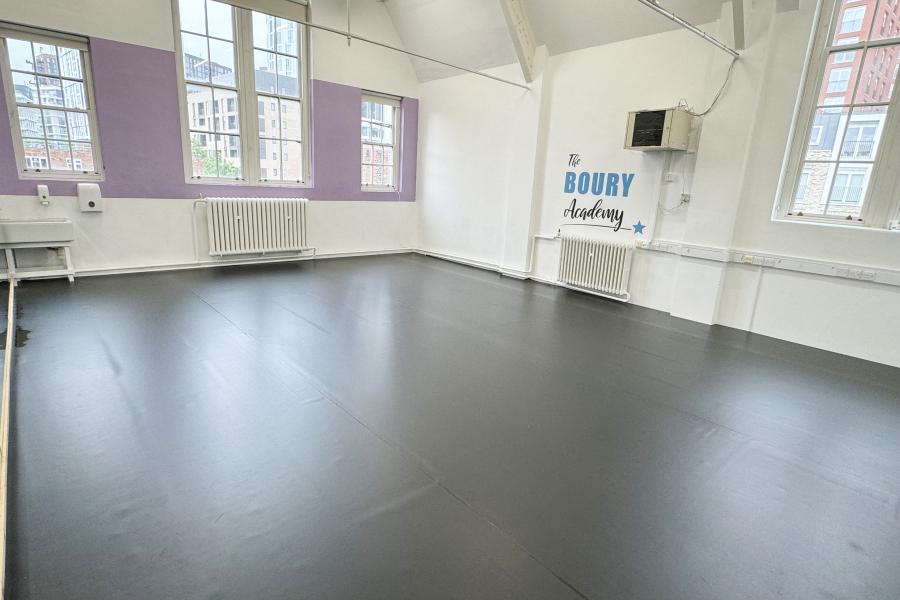 Versatile event space in DB Music London with natural light for workshops and meetings.