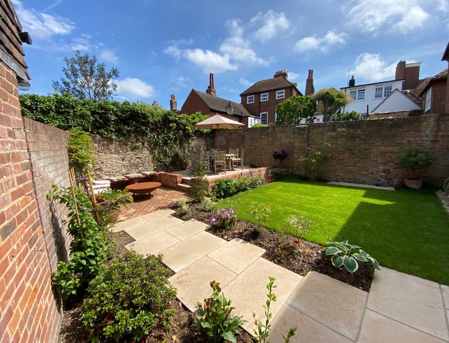 Courtyard Garden in Luxury Boltholes, serene outdoor space for gatherings and meetings.