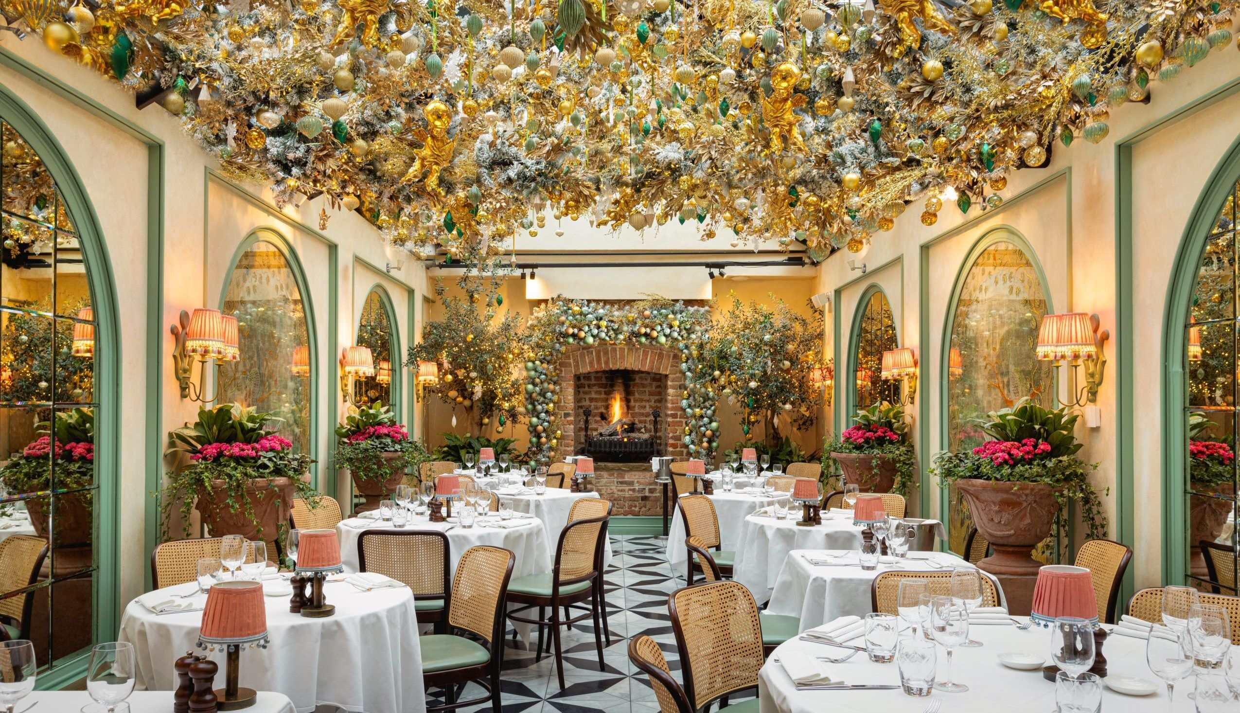 Elegant dining space at Daphne's with floral ceiling, perfect for upscale events.