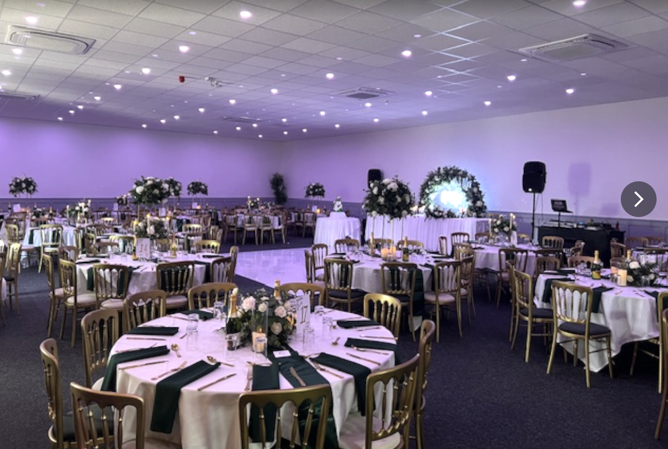 Elegant No.4 Events Hall with round tables, ideal for weddings and formal gatherings.