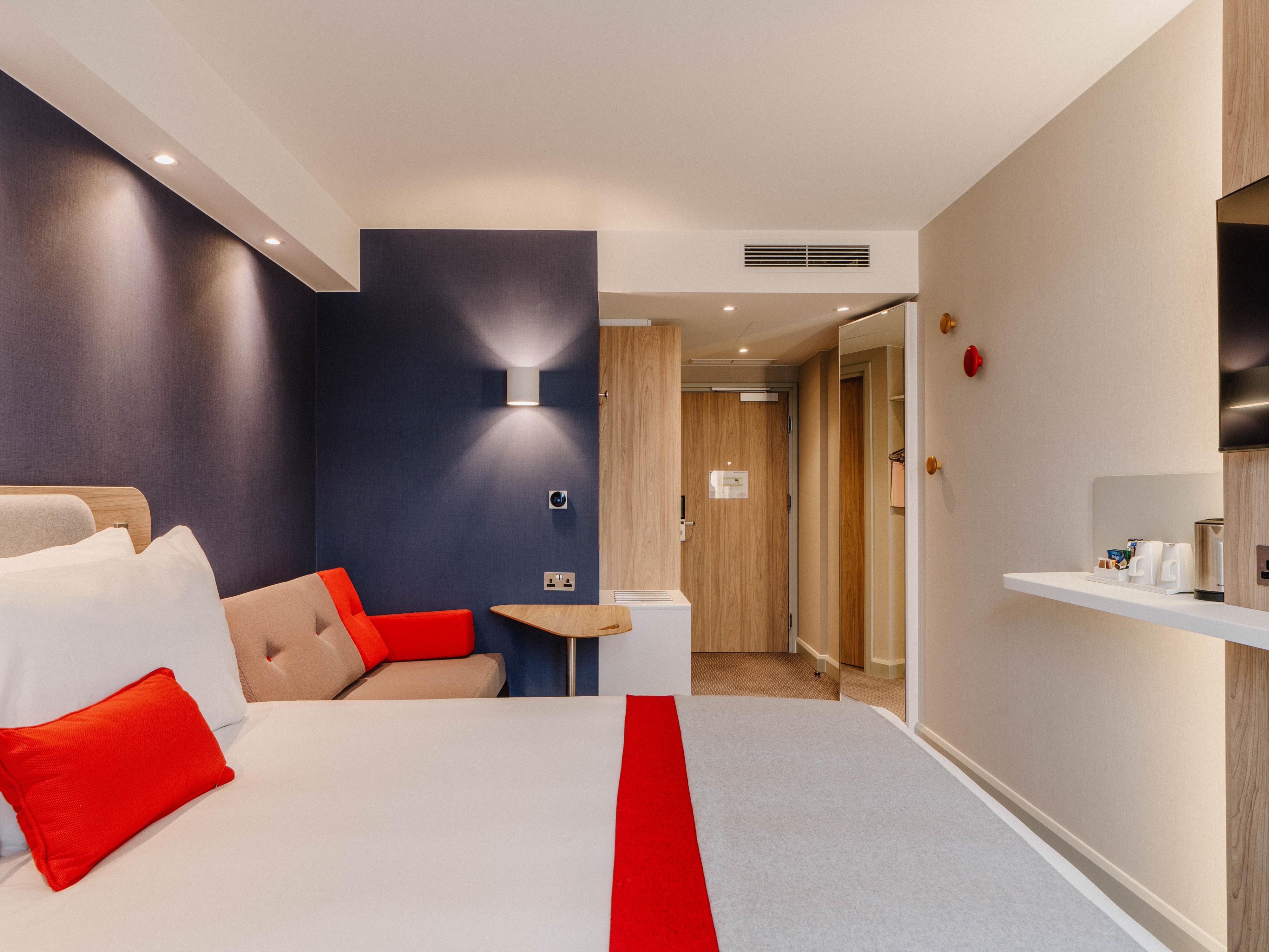Modern hotel room at Holiday Inn Express Liverpool, ideal for meetings and events.