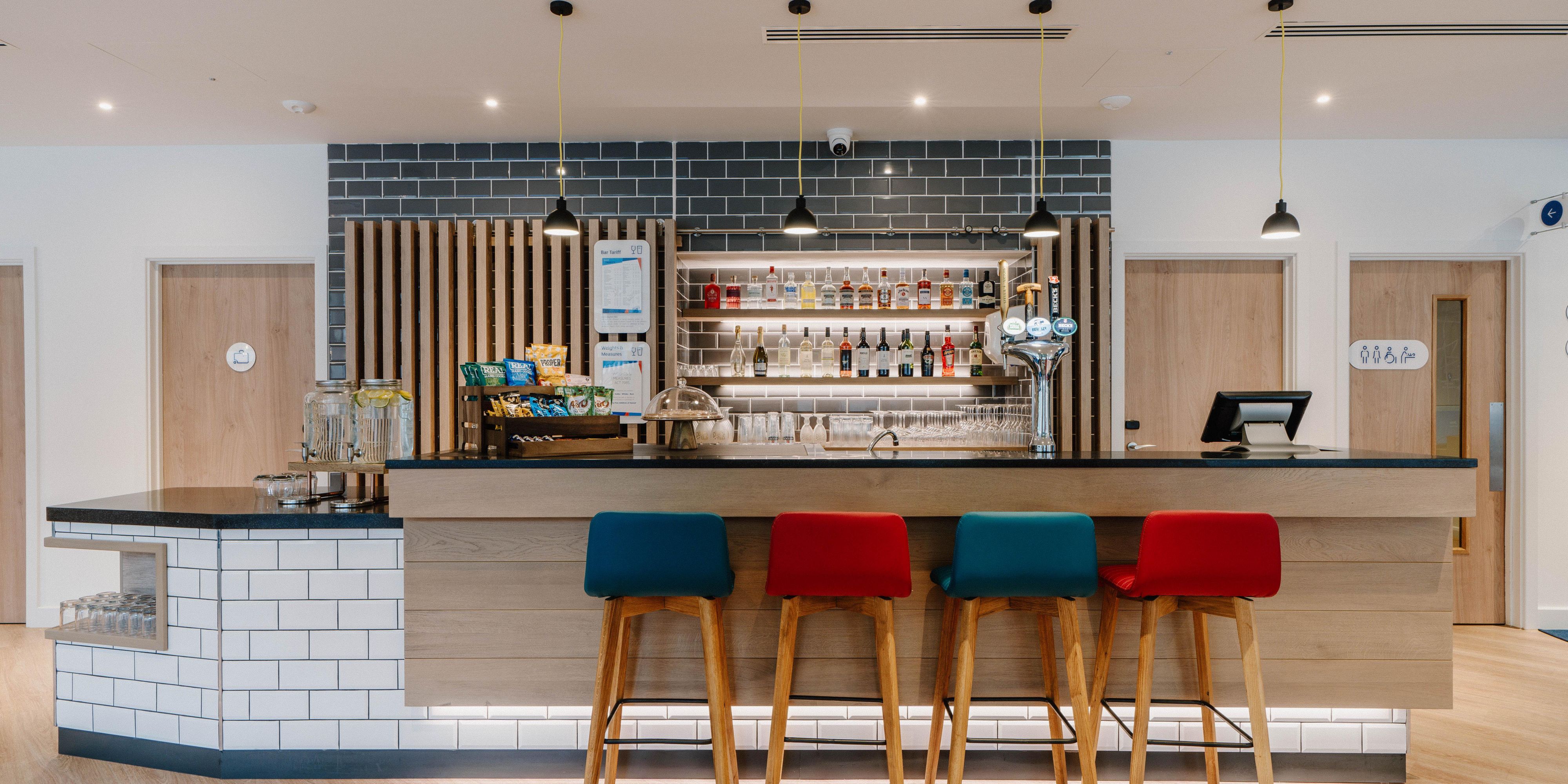 Modern bar at Holiday Inn Express Liverpool, ideal for networking events and gatherings.