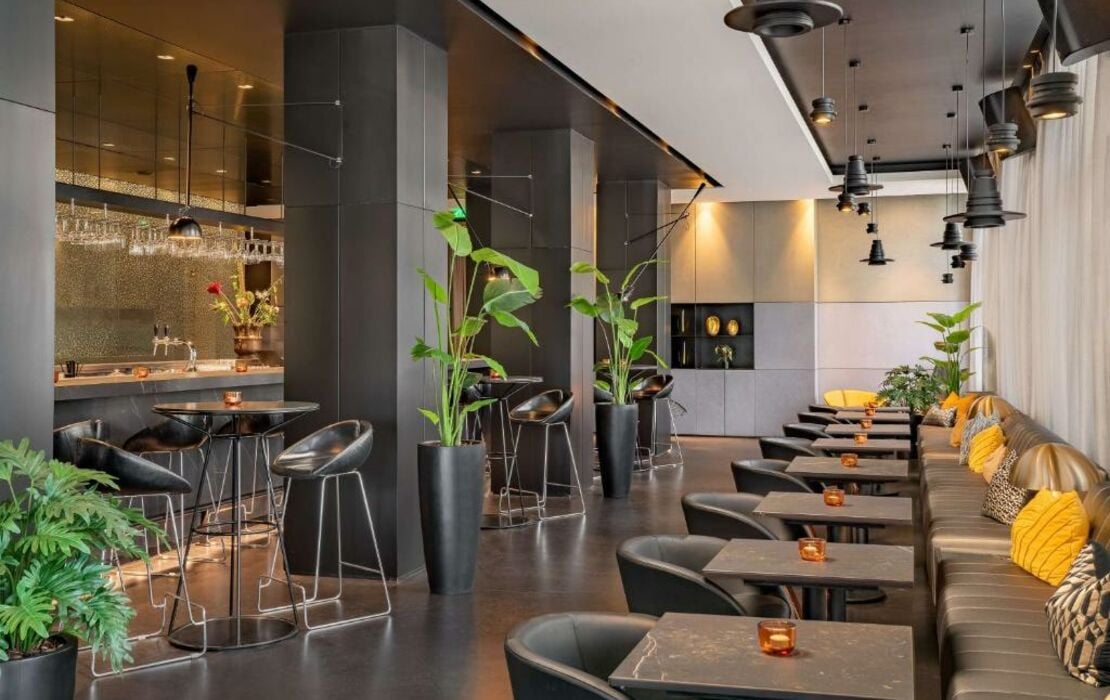 Private dining room at art'otel Amsterdam, modern venue for intimate gatherings and events.