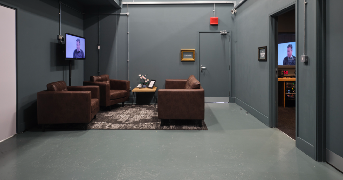 Modern minimalist meeting space in Studio EC4, perfect for hybrid events and discussions.