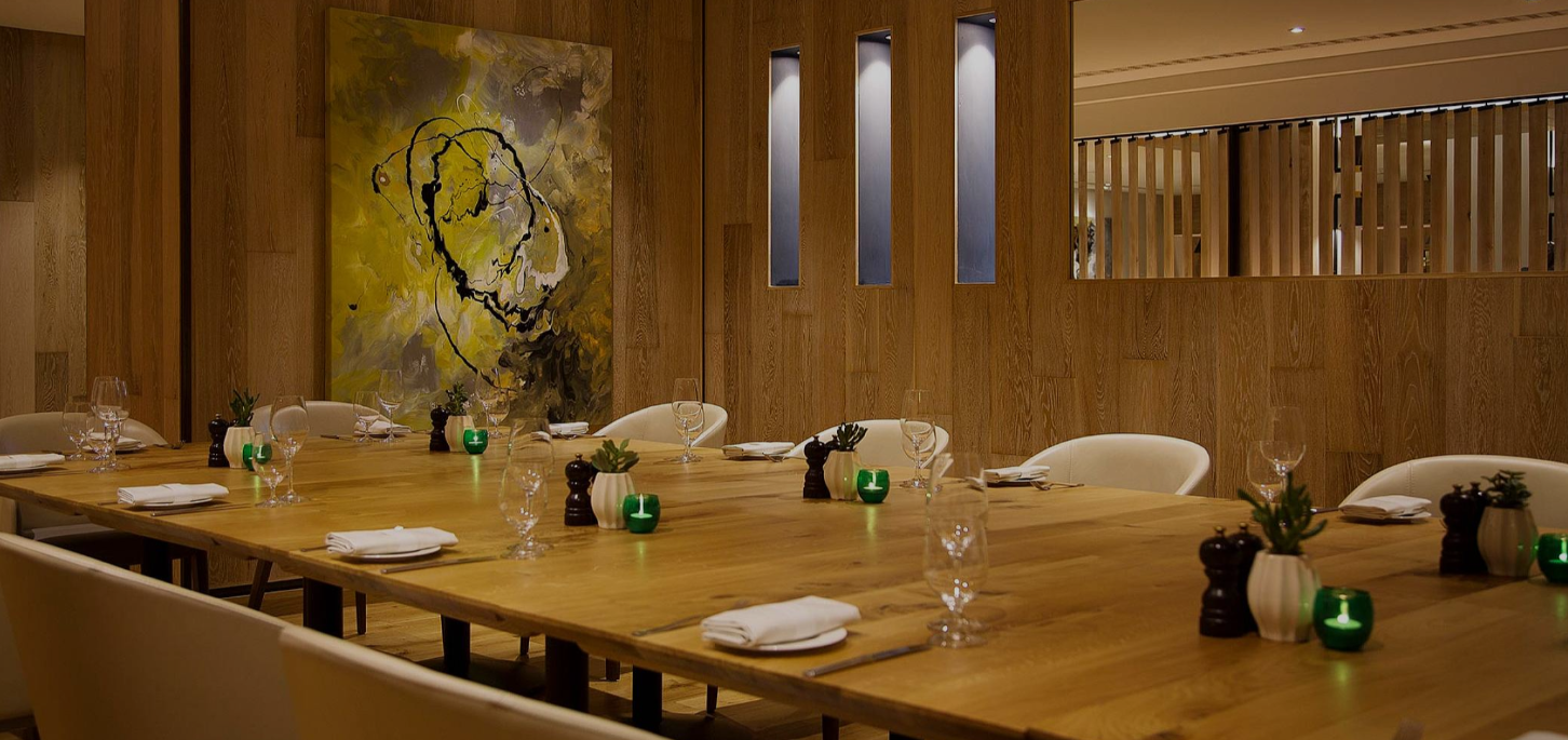 Amalfi Dining Room with elegant table setting for intimate meetings and exclusive events.