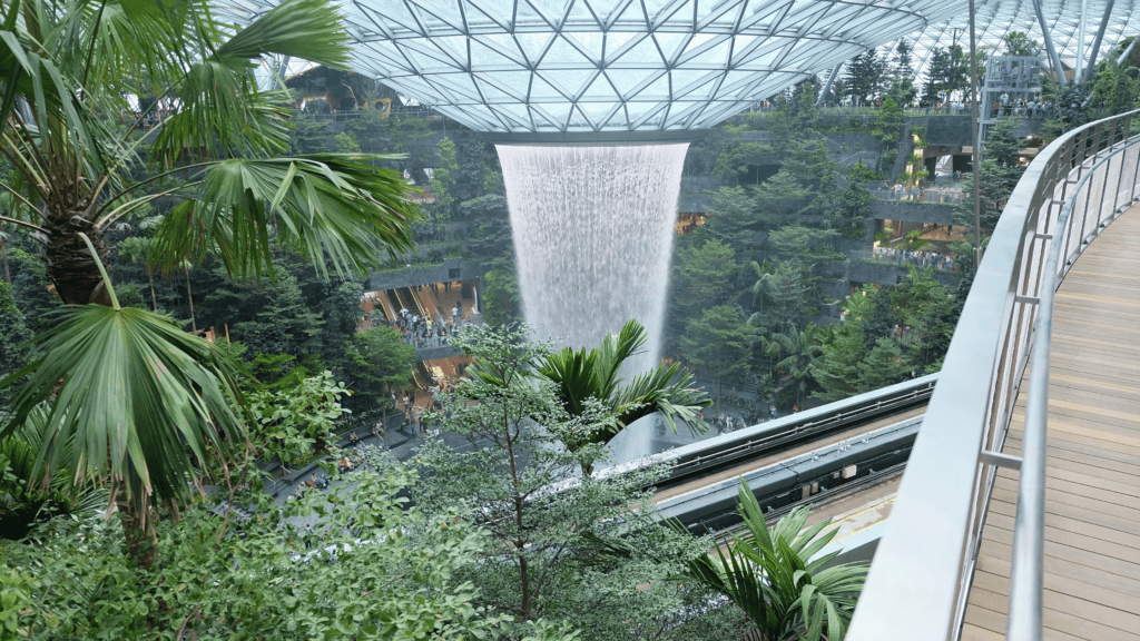 Indoor waterfall at Jewel Changi Airport, ideal for corporate retreats and networking events.
