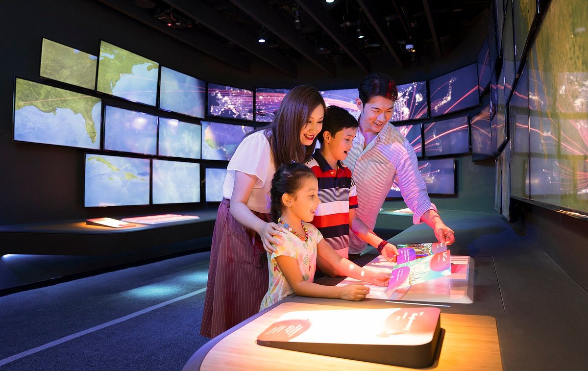 Changi Experience Studio Seminar Room with interactive screens for family events.
