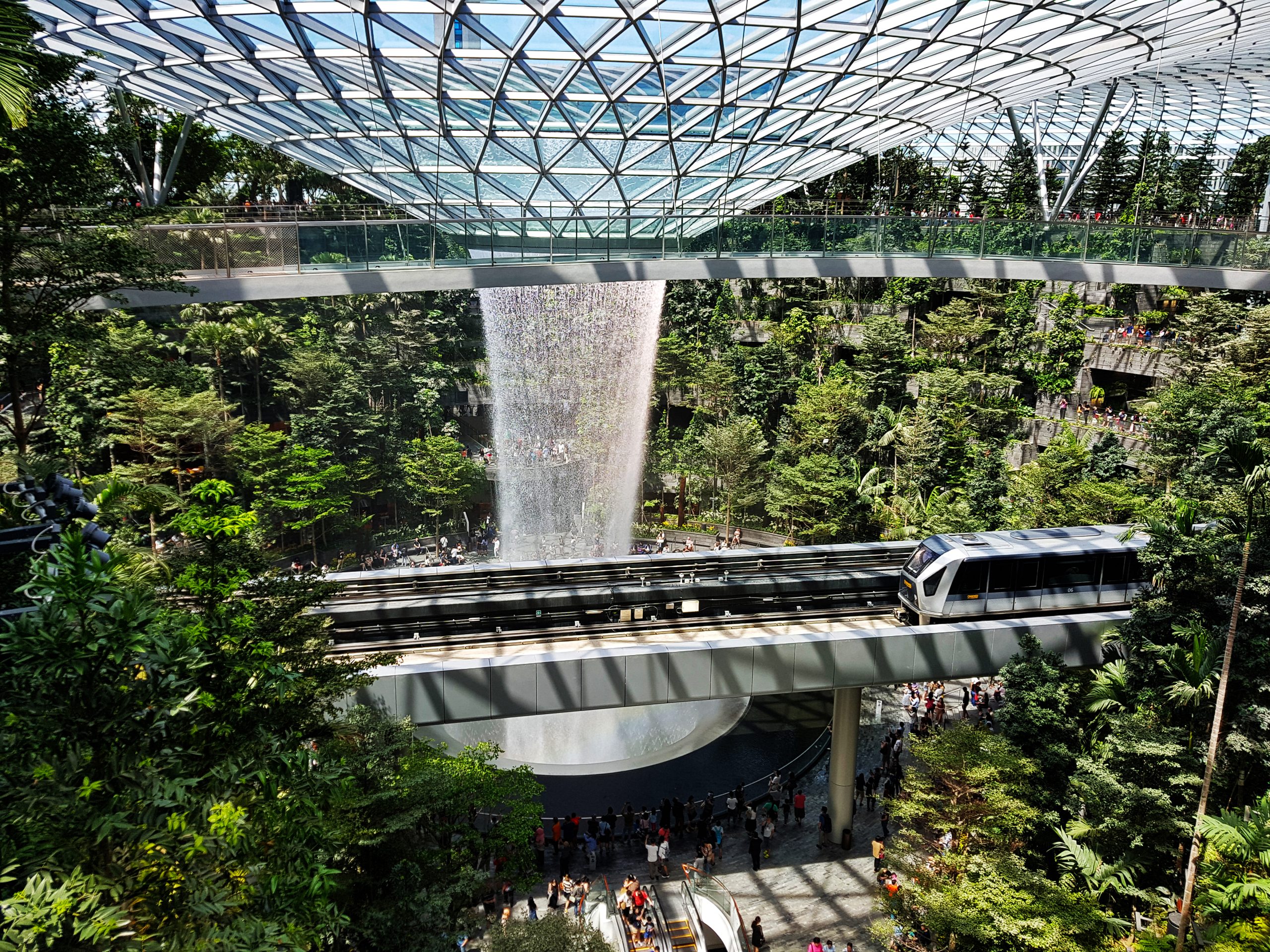 Jewel Atrium at Changi Airport with indoor waterfall, ideal for corporate events and workshops.