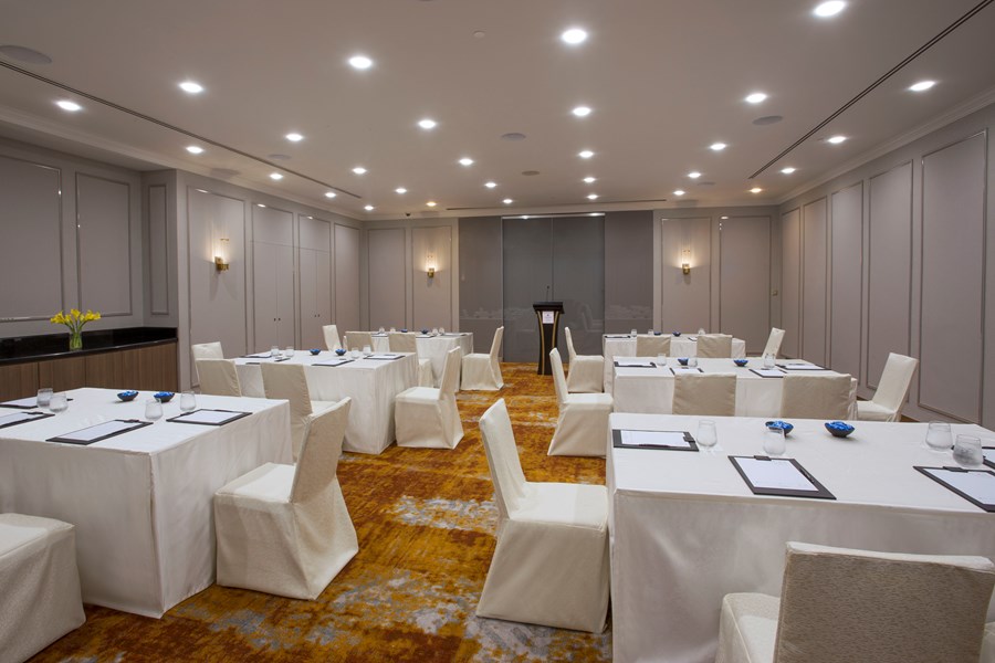 Modern meeting room at Orchard Hotel Singapore, ideal for corporate events and workshops.