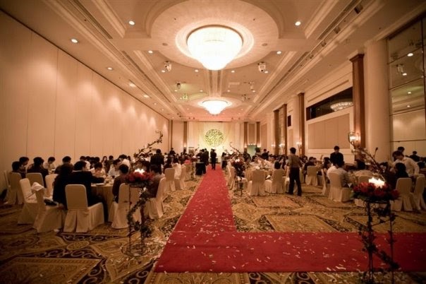 Orchard Grand Ballroom, elegant banquet hall for weddings and formal events, with red carpet.
