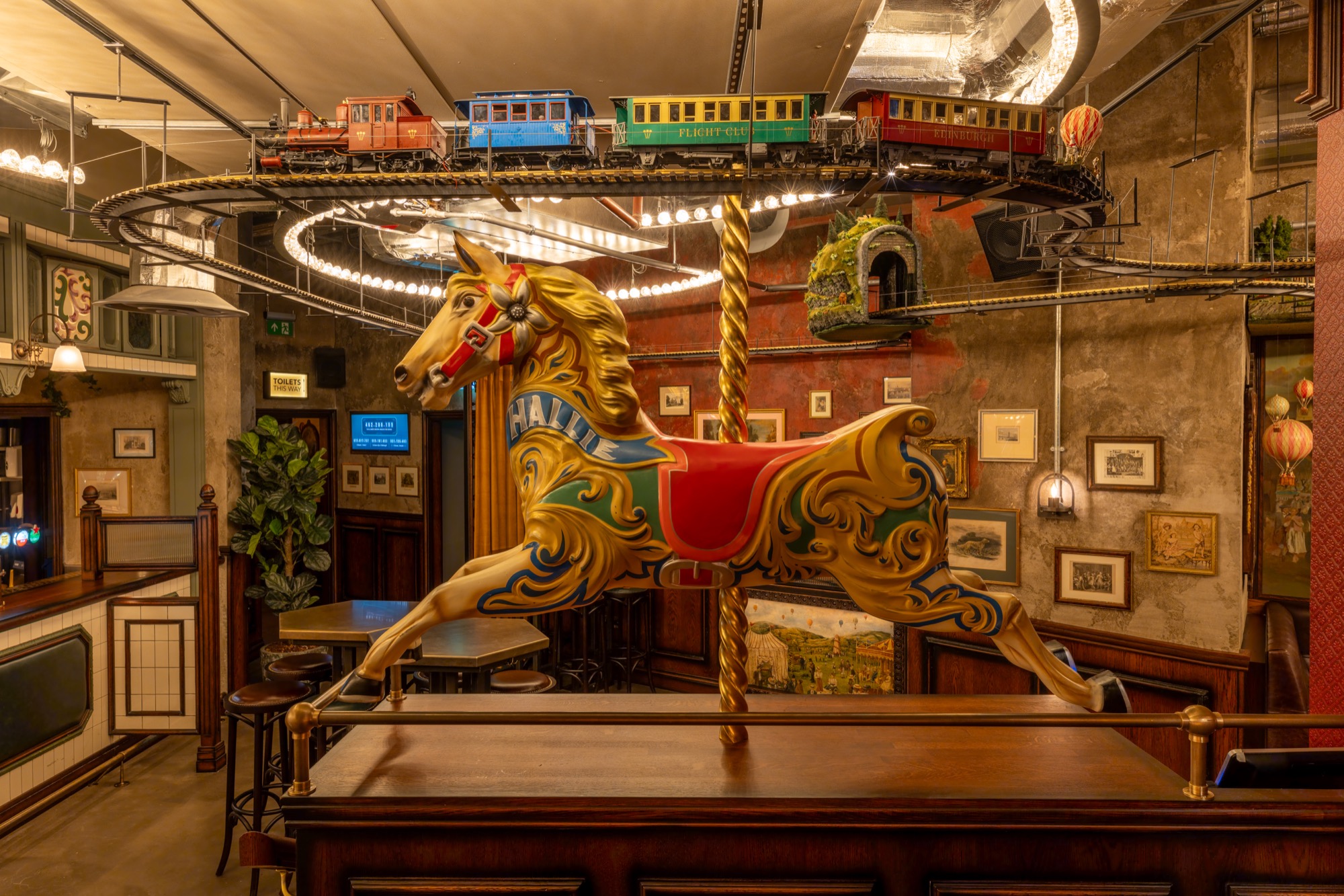 Thistle at Flight Club Edinburgh with carousel horse, ideal for events and gatherings.