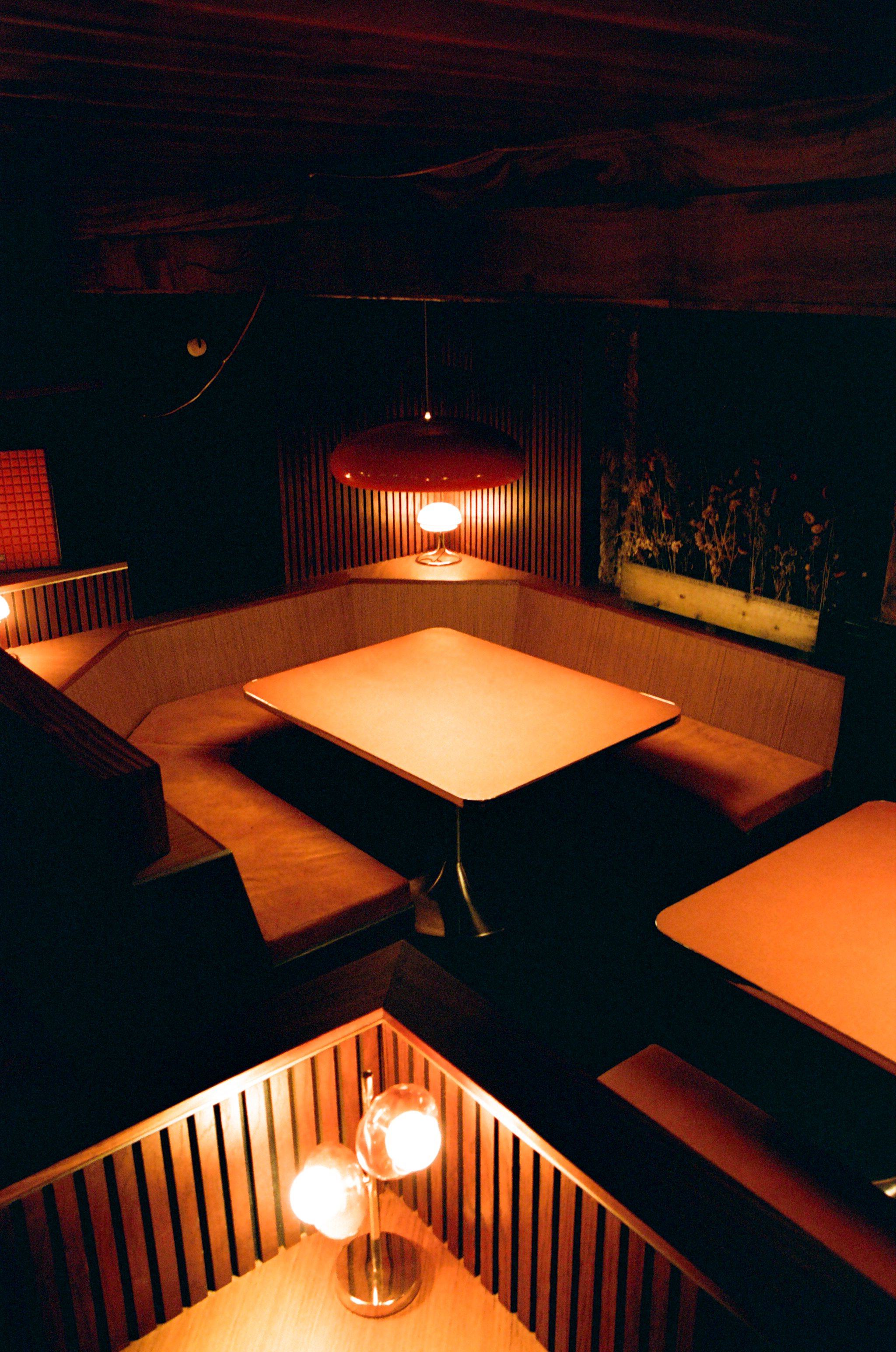 Cozy Marquee Moon Basement with warm lighting, perfect for meetings and brainstorming.