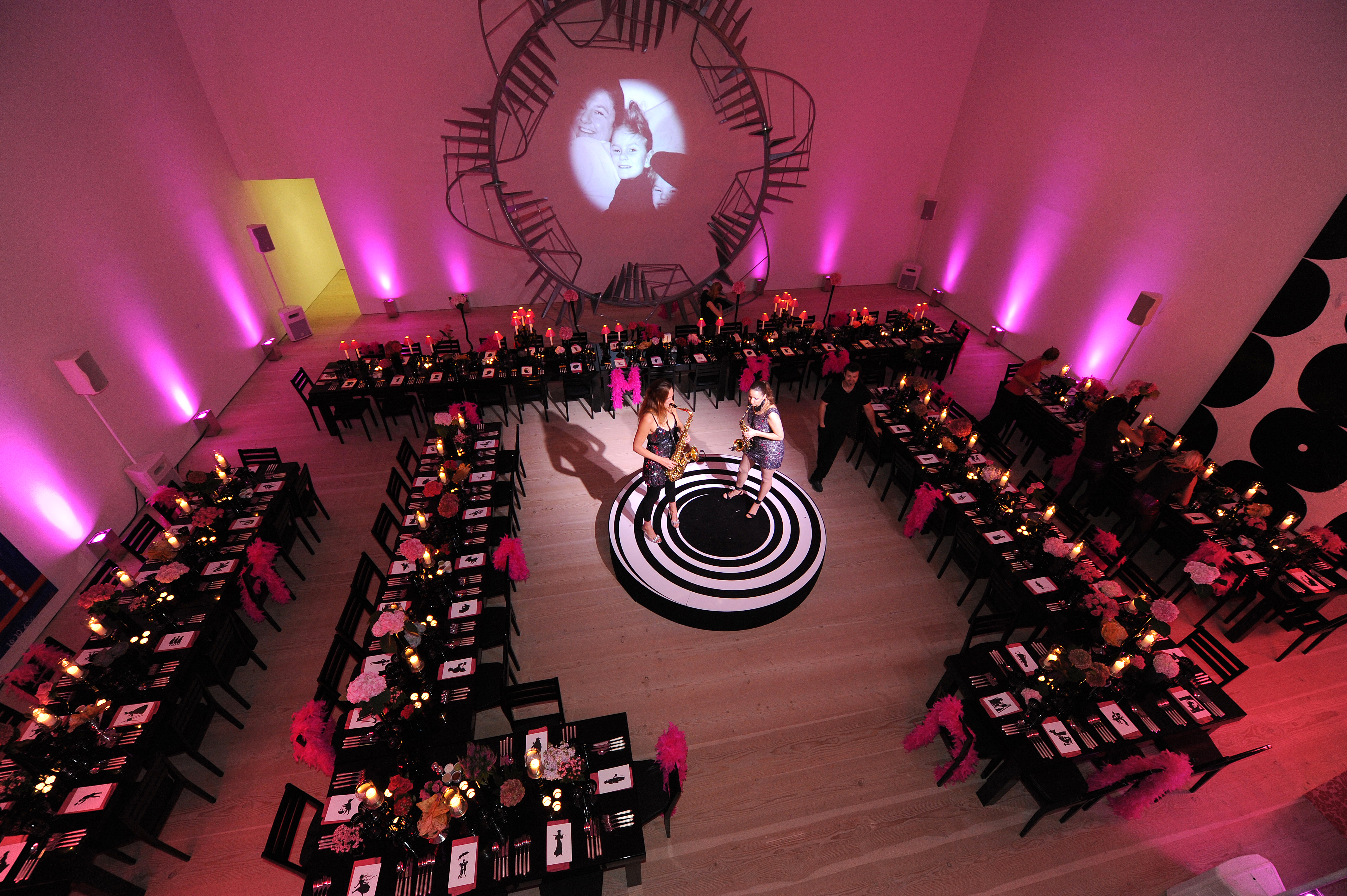 Elegant event setup at Saatchi Gallery with floral centerpieces, ideal for gala or corporate events.