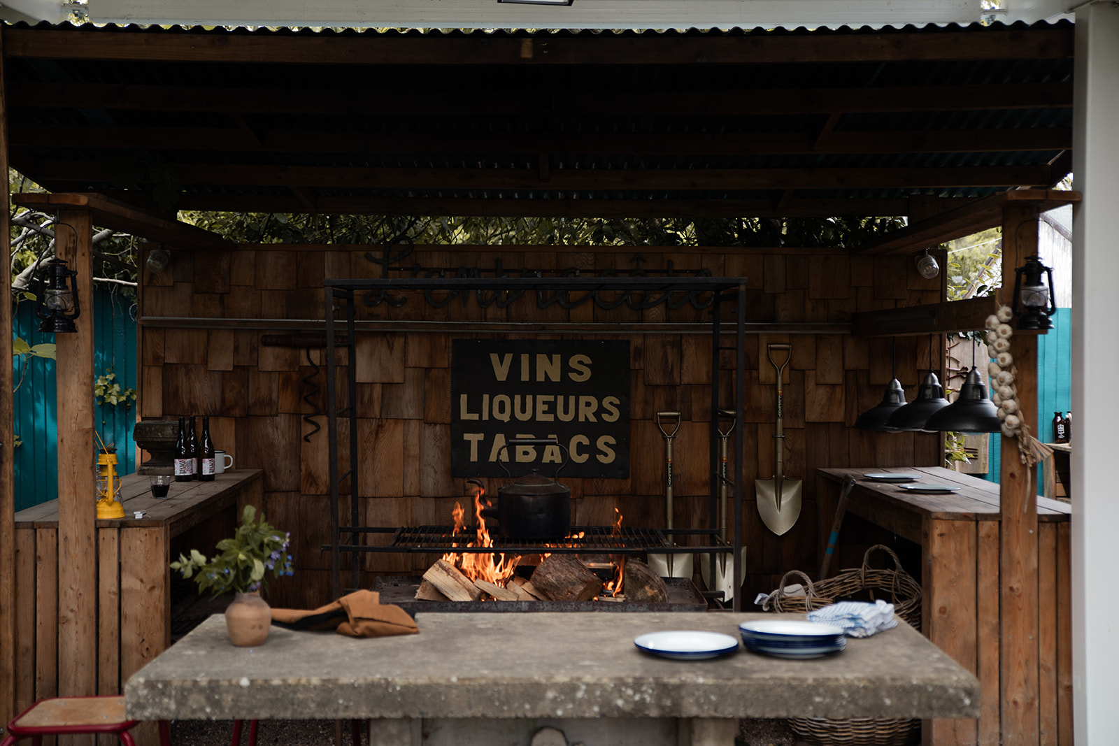 Walled Garden at Hawarden Estate with fire pit, perfect for outdoor events and gatherings.