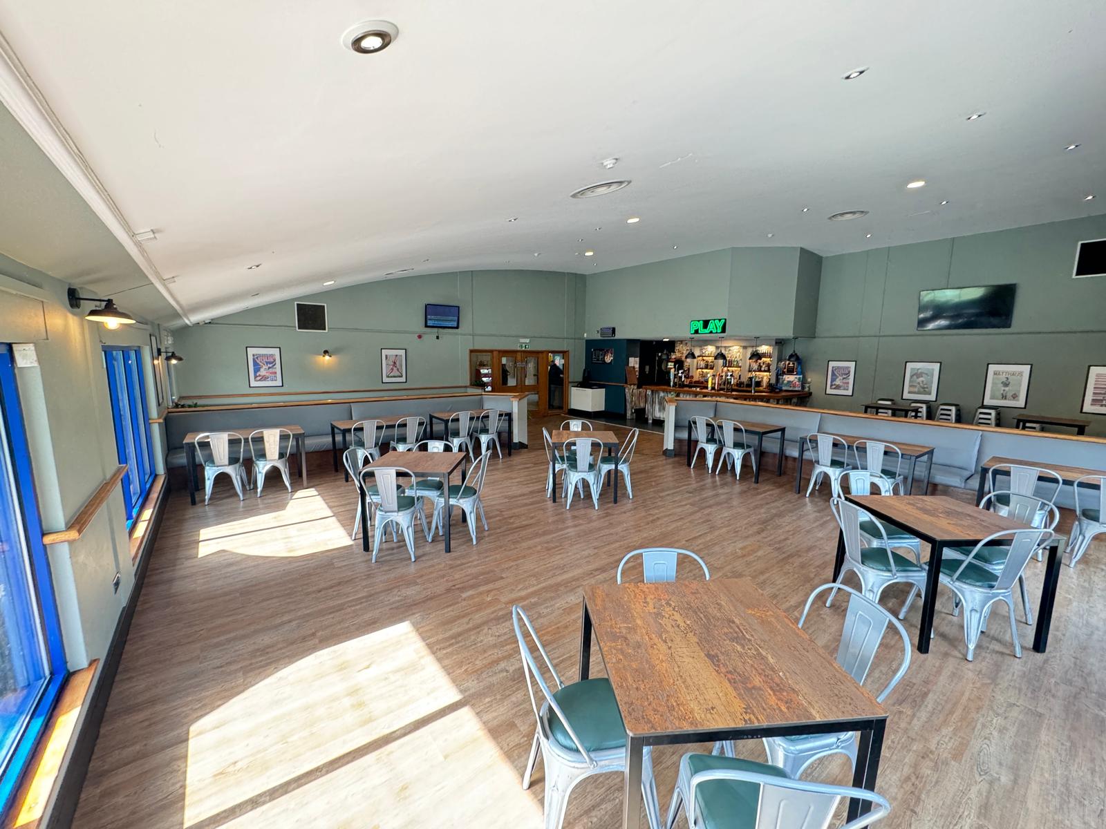 Function room in Powerleague Slough, modern layout for events and meetings.