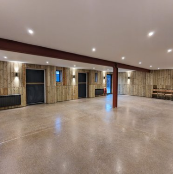 Corporate Hire event space with rustic wooden interior, ideal for gatherings and workshops.