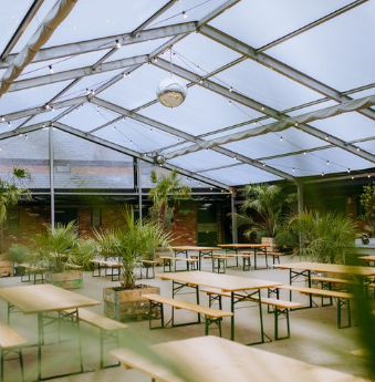 Clear-roofed event space at Blackpit Brewer for corporate gatherings and meetings.