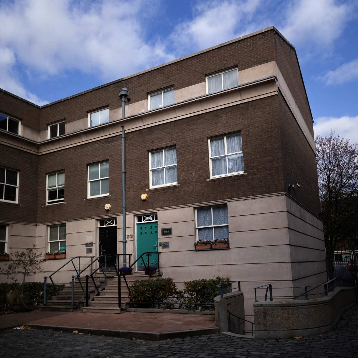 Millicent at Aspire House, a modern venue with large windows for events and meetings.