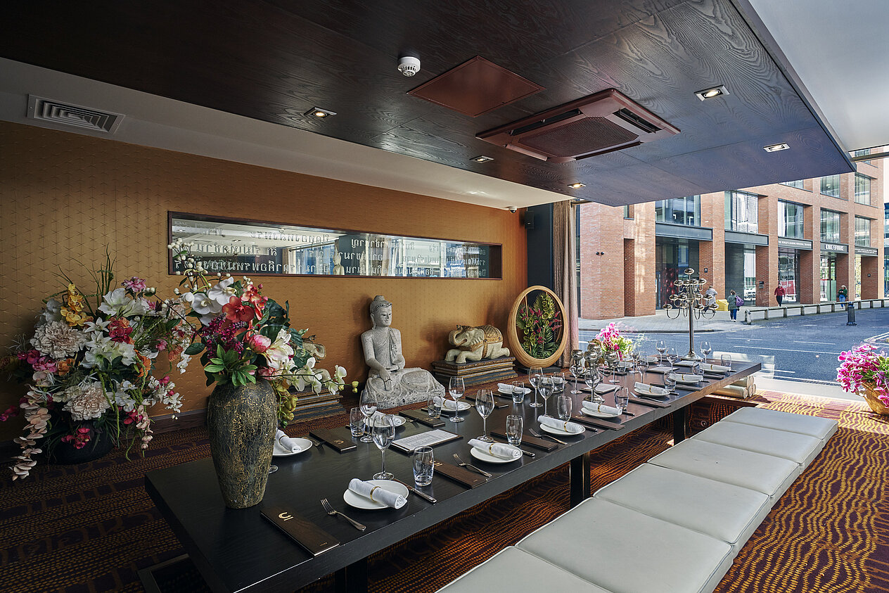 Private dining room in Chaophraya Leeds, elegant setup for exclusive events and meetings.