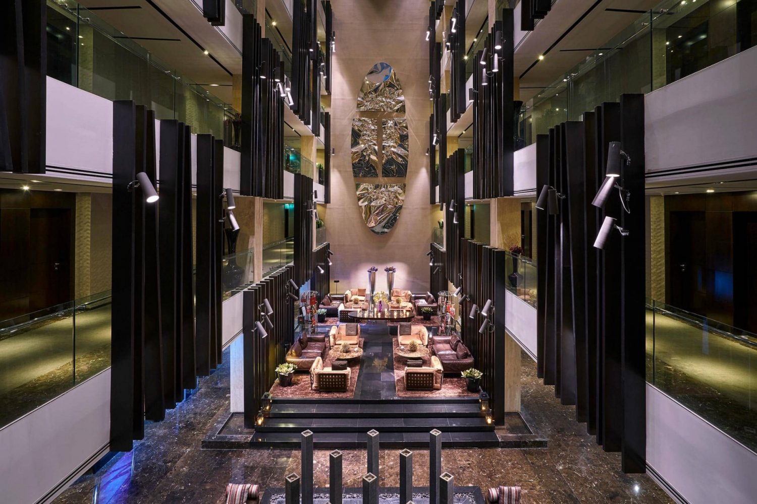 Multifunctional Meeting Room at The Canvas Hotel, elegant atrium for upscale events.