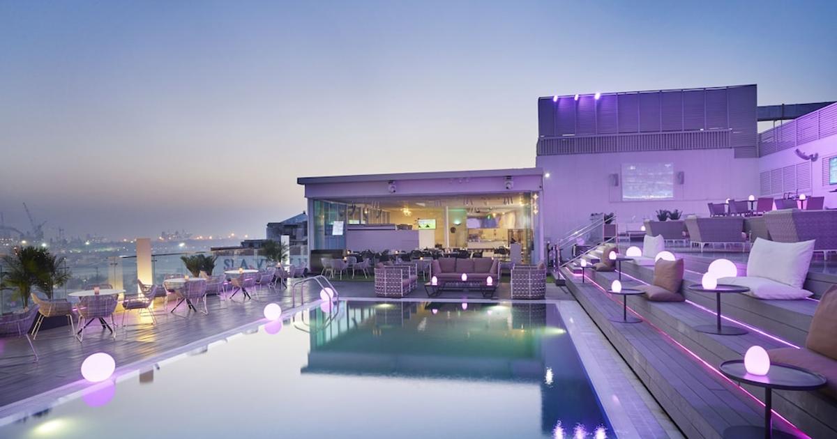 Rooftop terrace at The Canvas Hotel with sleek pool, ideal for upscale events and gatherings.