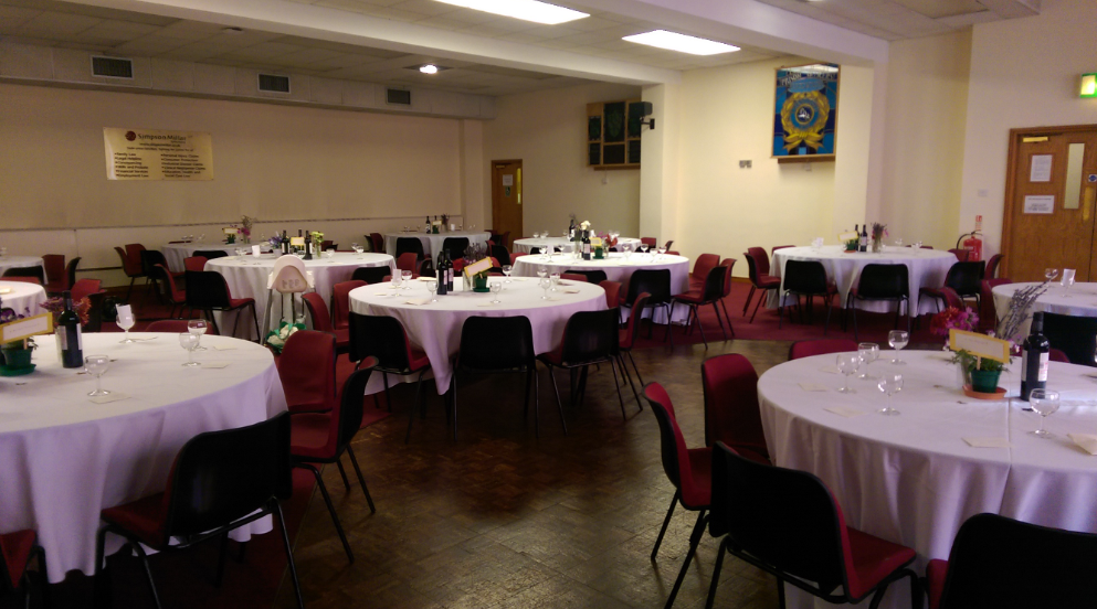 Large Hall at Mechanics Conference Centre, round tables for events, ideal for dinners and conferences.