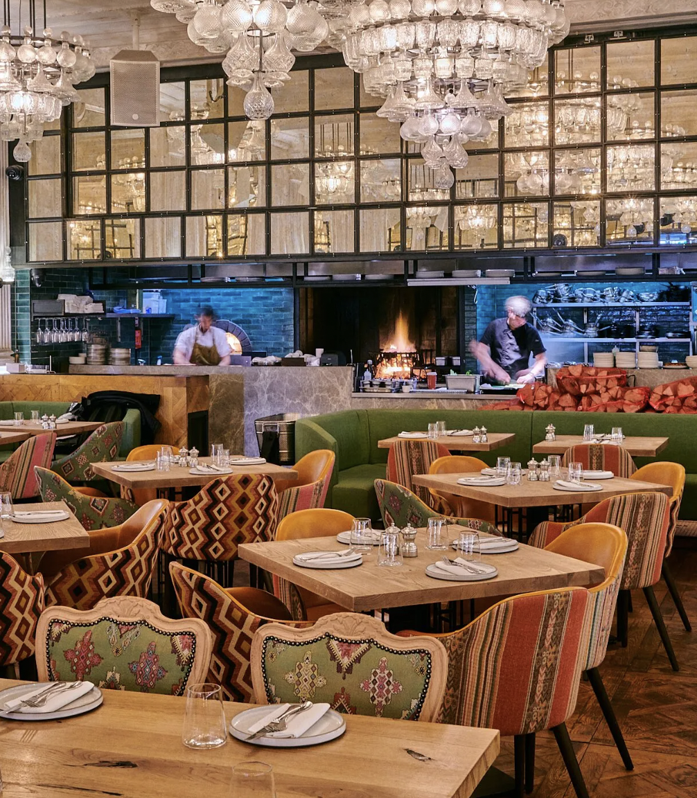 Stylish Sucre Bar restaurant with warm lighting, ideal for upscale events and gatherings.