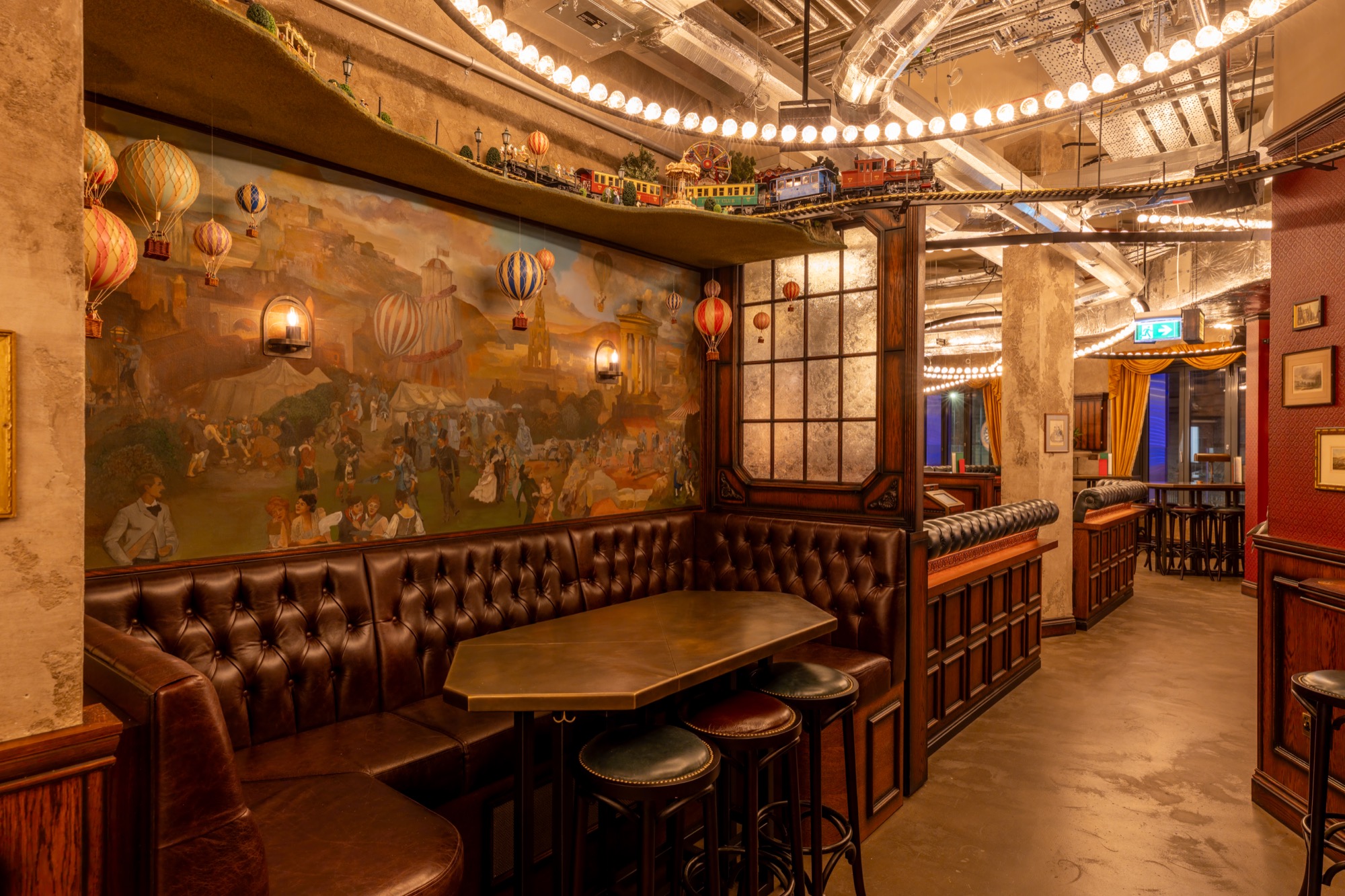 Cozy vintage venue in Flight Club Edinburgh, perfect for intimate meetings and social events.