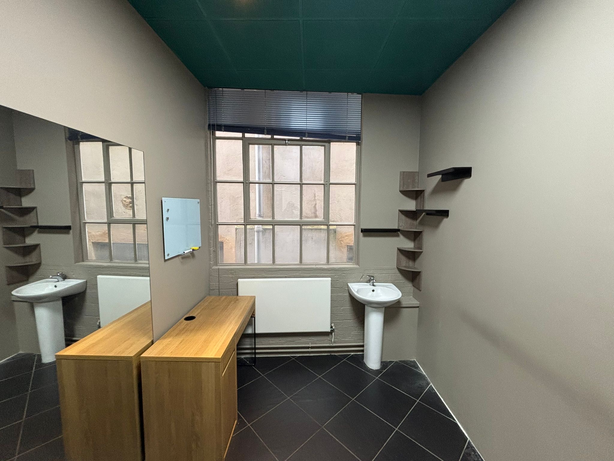 Modern personal office space with natural light at The Factory Fitness & Dance Centre.