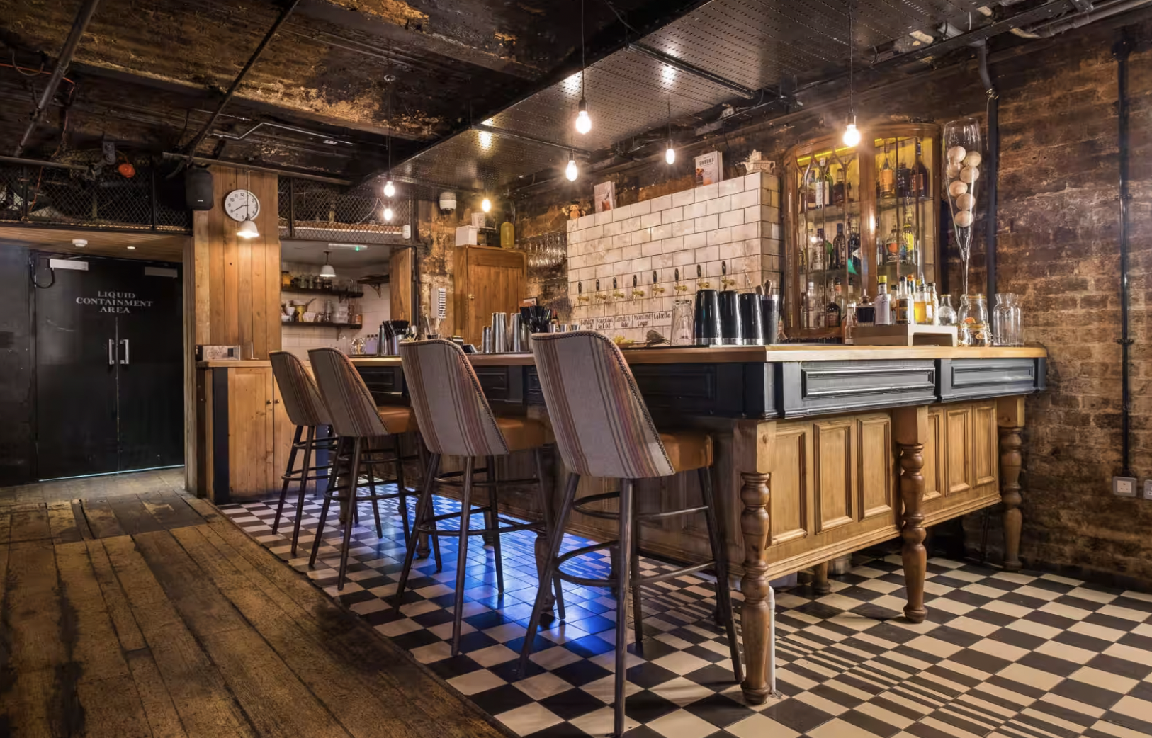 Stylish bar at WN Barkers, featuring wooden furnishings for networking events.
