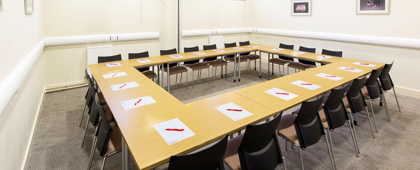Seacole and Bly meeting room, U-shaped setup for professional events and discussions.