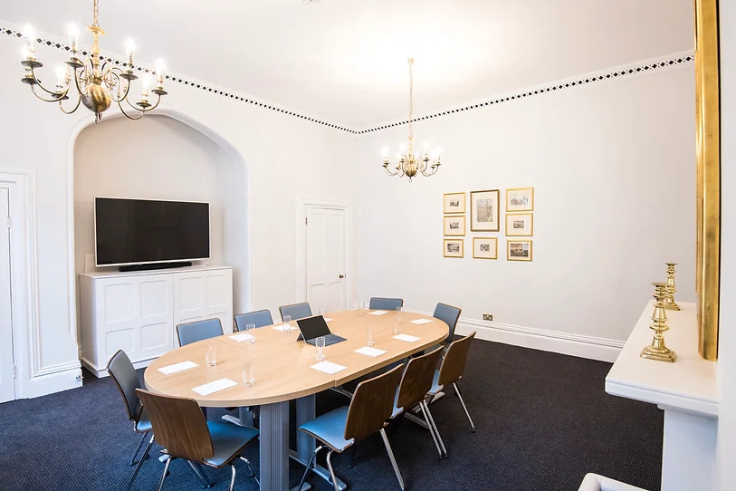 Marsden room at Holborn Venues: modern meeting space with circular table for collaboration.