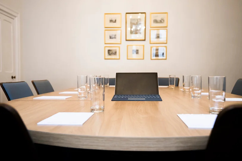 Marsden room in Holborn Venues, featuring a large oval table for conferences and meetings.