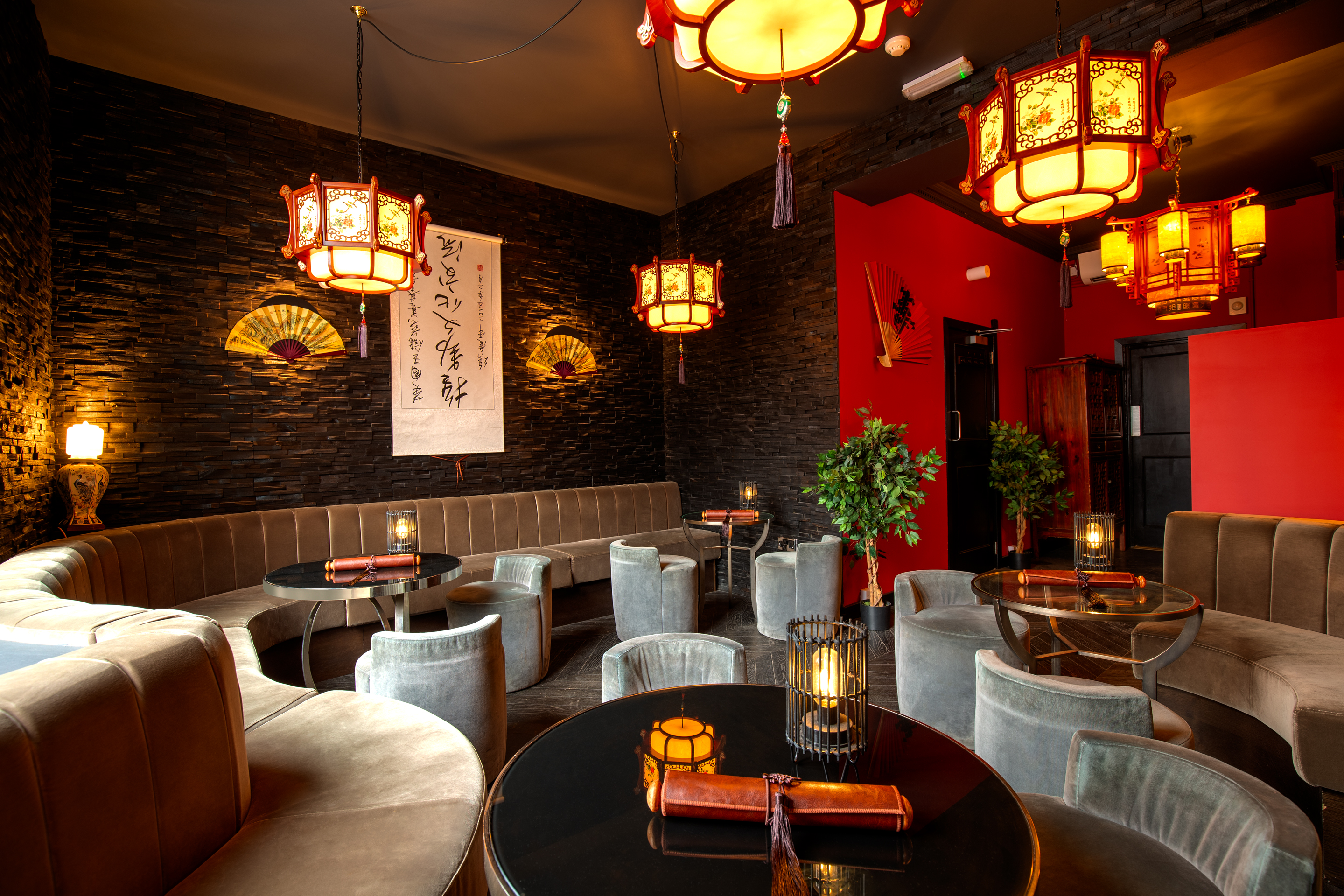 Stylish Shanghai Cocktail Lounge with warm lighting, ideal for upscale events and gatherings.