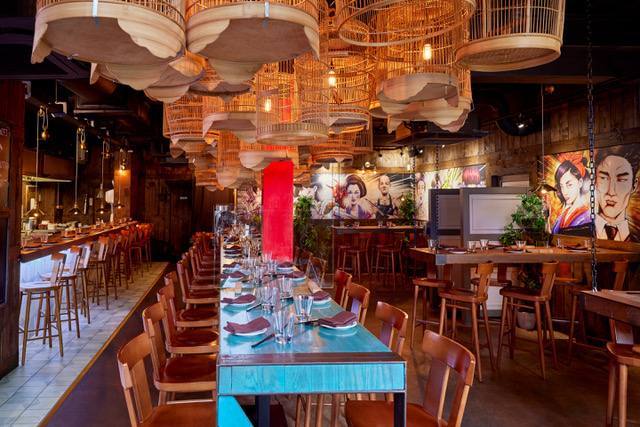 Vibrant Yuu Kitchen event space with unique lights, ideal for gatherings and celebrations.