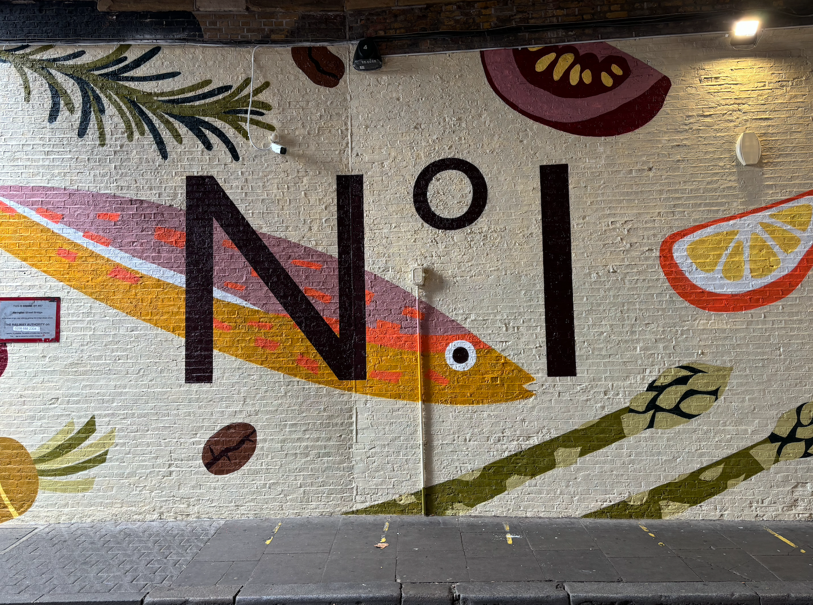 Vibrant mural backdrop at Whole Venue, perfect for culinary events and gatherings.