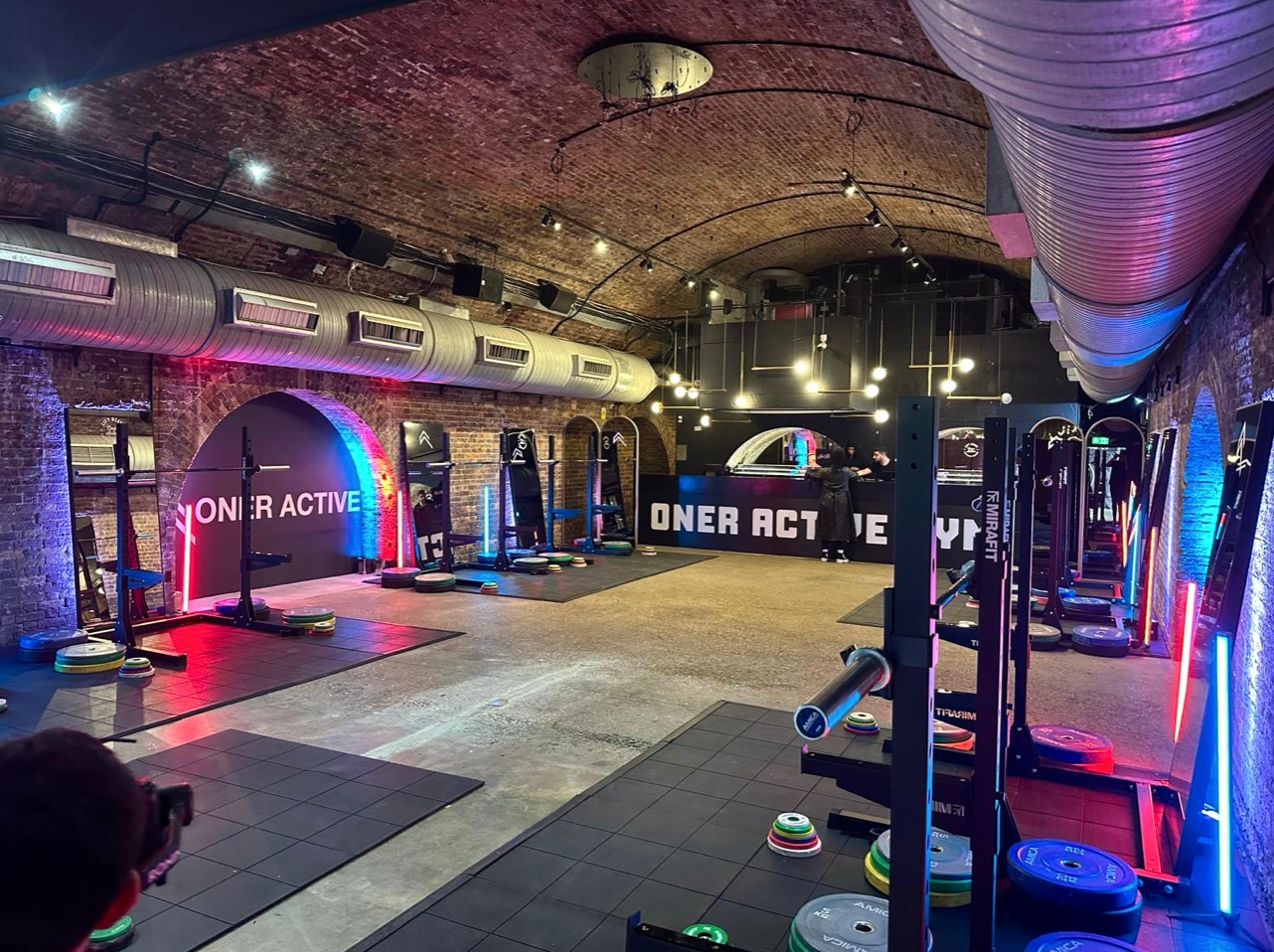 Modern fitness venue with sleek equipment for corporate wellness events.