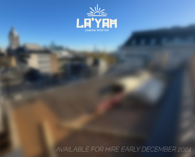 La'Yam Rooftop venue with urban backdrop, ideal for stylish events and gatherings.