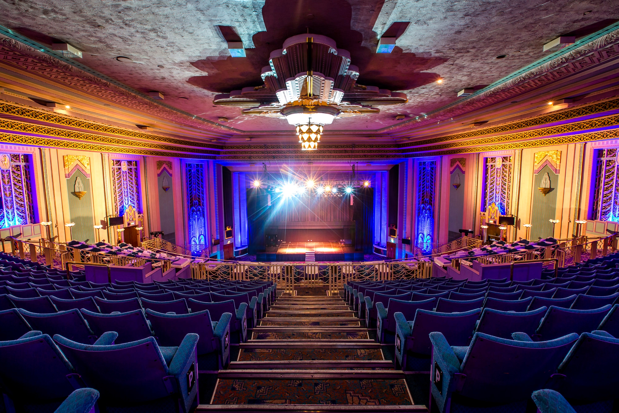 Elegant Grand Hall in Troxy, ideal for events and meetings with vibrant lighting.